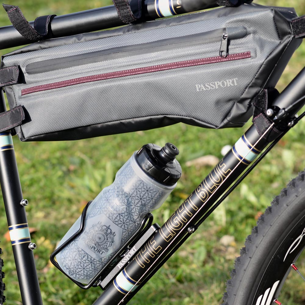 Passport flaskeholder flytter